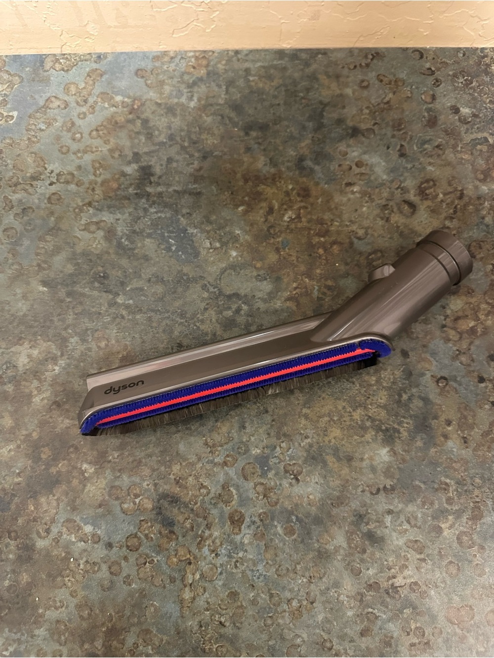 Dyson Soft Roller Brush Head in Gray with Blue and Red Accents